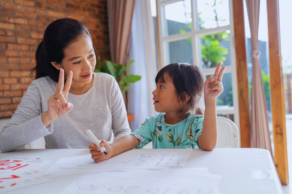 Preschool child doing hands-on learning activity with everyday materials